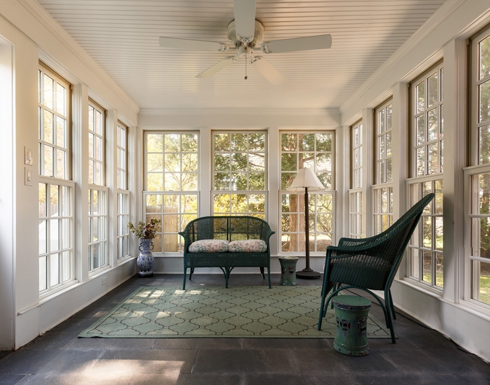 170 Reservoir Road Brookline, MA 02467 - Photo 19 of 20 a living room with furniture and a large window