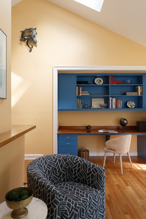170 Reservoir Road Brookline, MA 02467 - Photo 9 of 20 a living room with a couch and a table