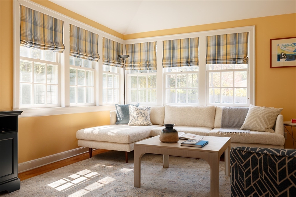 170 Reservoir Road Brookline, MA 02467 - Photo 10 of 20 a living room with furniture and a large window