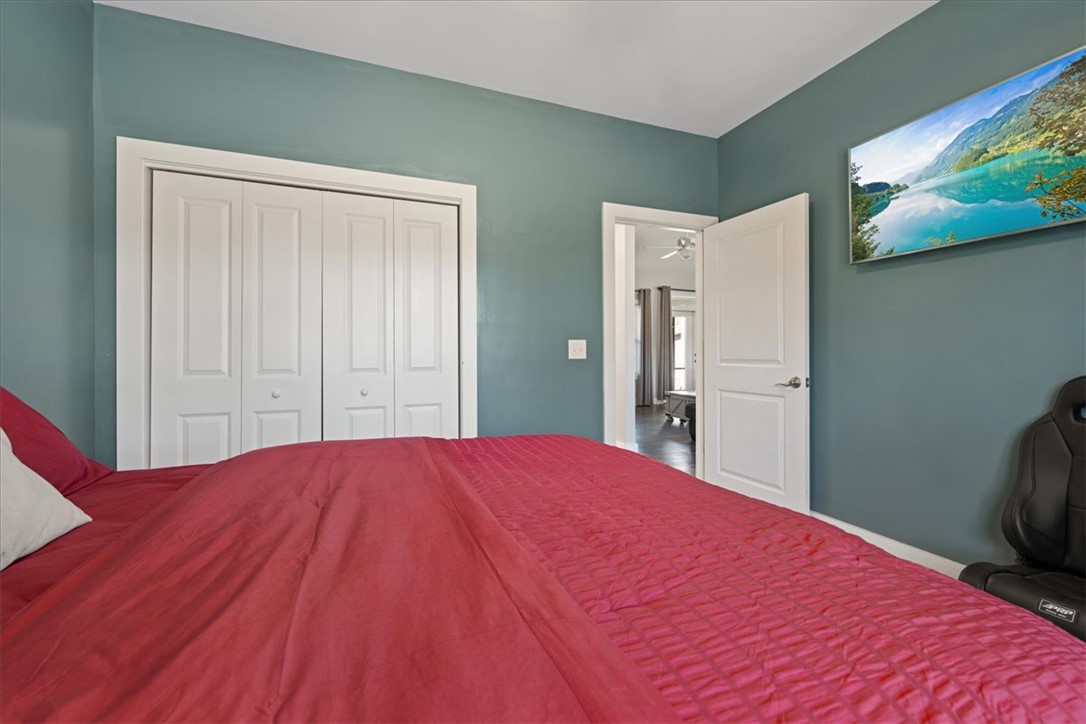 212 Winding Lane Seneca, SC 29672 - Photo 19 of 48 This spacious bedroom offers ample storage with a functional closet.