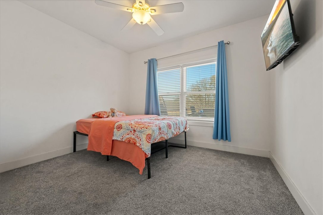 212 Winding Lane Seneca, SC 29672 - Photo 21 of 48 This cozy bedroom features bright natural light and a comforting atmosphere.