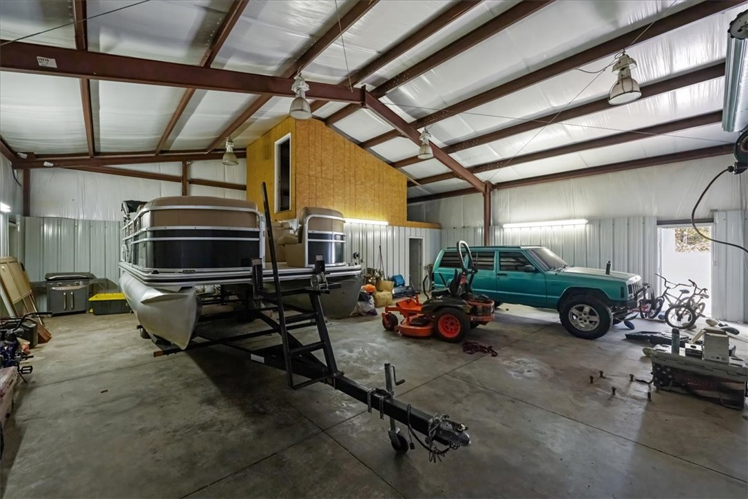 212 Winding Lane Seneca, SC 29672 - Photo 40 of 48 This spacious utility building offers ample room for storage and various activities.