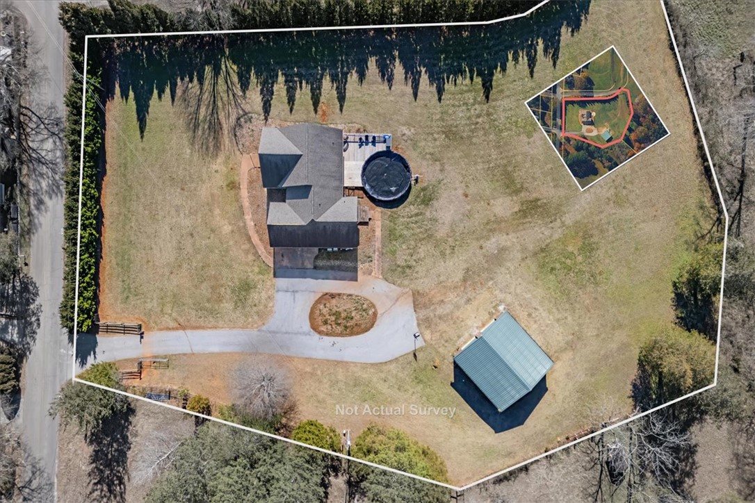 212 Winding Lane Seneca, SC 29672 - Photo 48 of 48 Expansive property featuring a residence, detached garage, and an inviting above-ground pool.