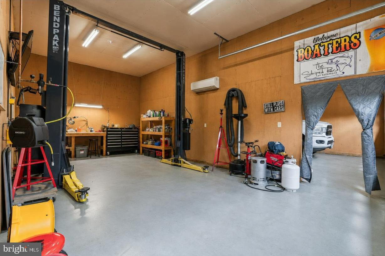 12345 H G Trueman Road Lusby, MD 20657 - Photo 29 of 38 a view of game room with gym equipment