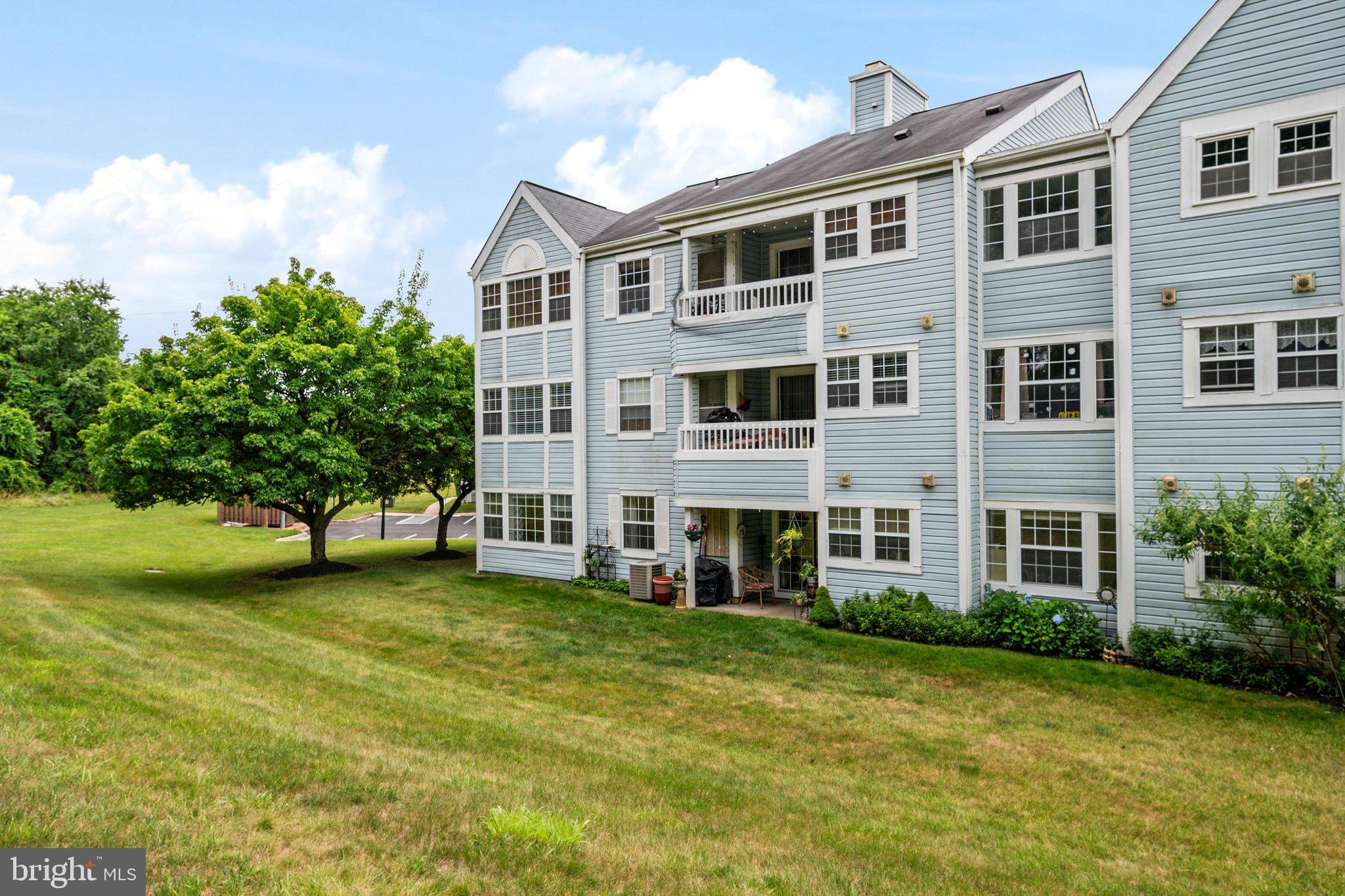 8337 Montgomery Run Road, Unit C Ellicott City, MD 21043 - Photo 23 of 24 Rear view of home overlooking green space