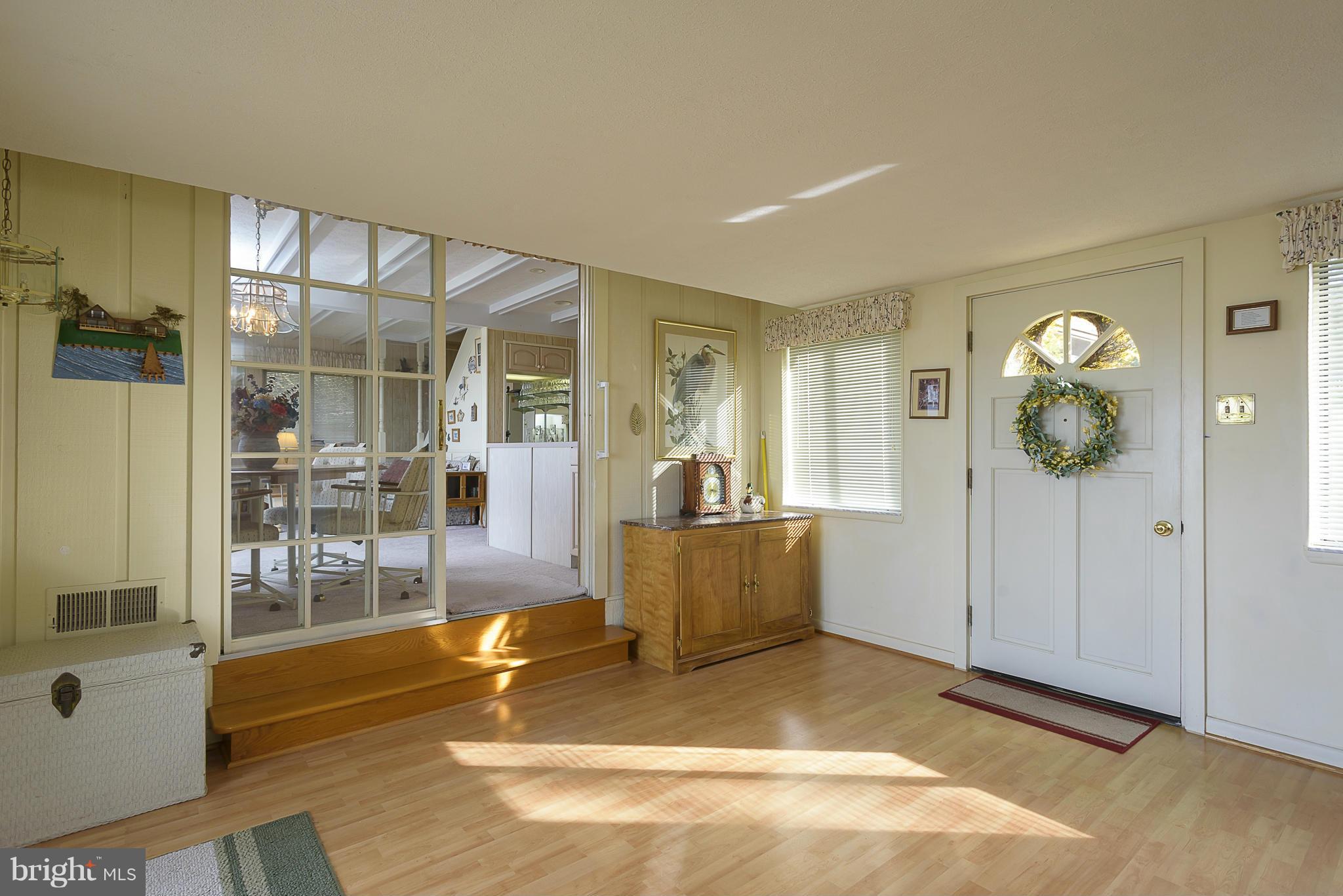 1042 Wiers Road Edgewater, MD 21037 - Photo 11 of 30 Breezeway to Living Area