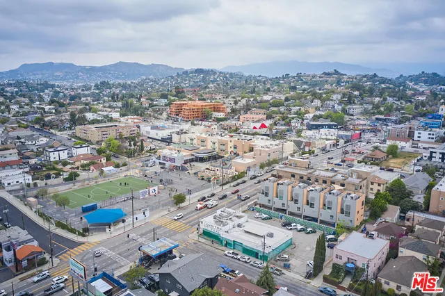 an aerial view of a city with lots of residential buildings