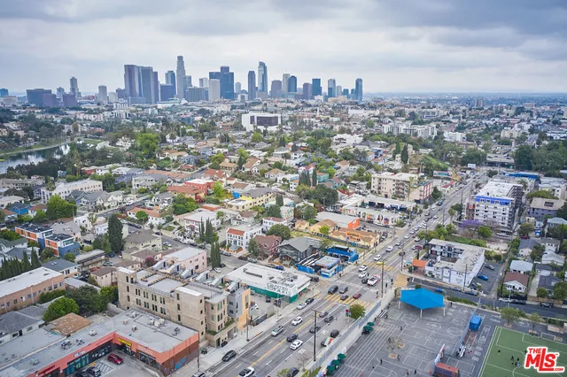 an aerial view of a city with lots of residential buildings