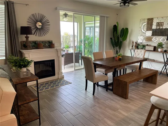 a view of a livingroom with furniture and a fireplace