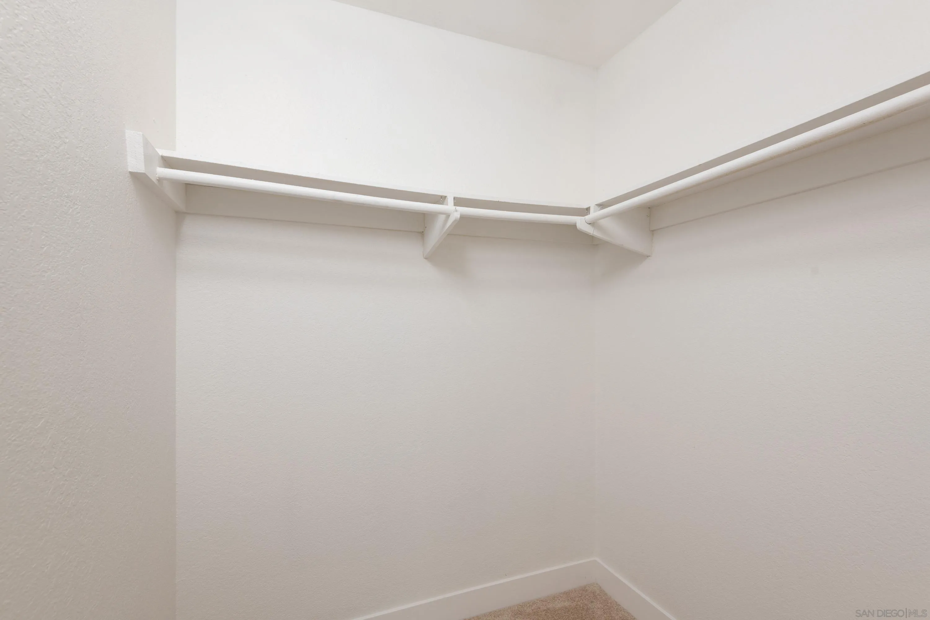 441 D Avenue Coronado, CA 92118 - Photo 11 of 24 a view of an empty walk in closet