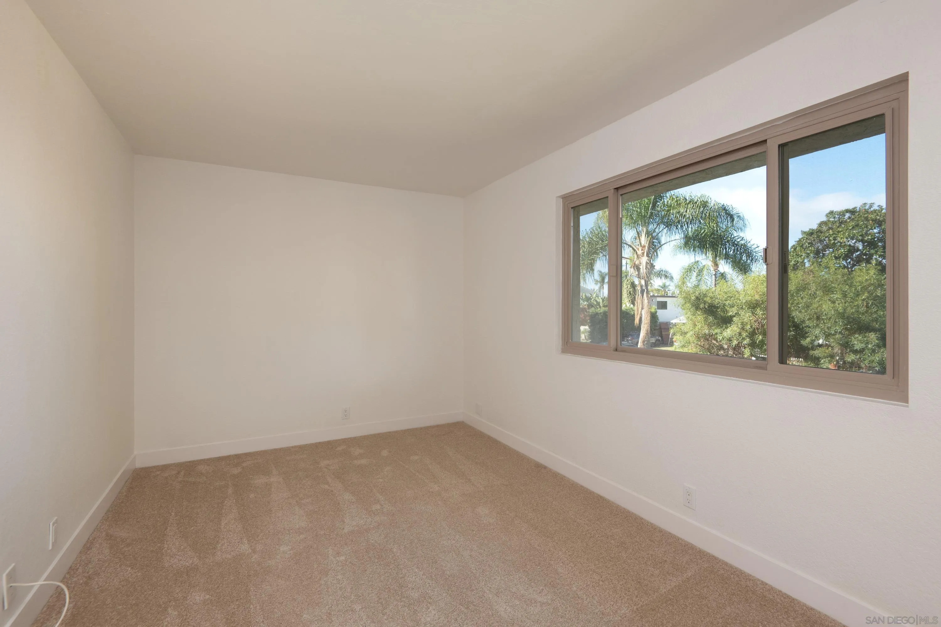 441 D Avenue Coronado, CA 92118 - Photo 13 of 24 an empty room with a window