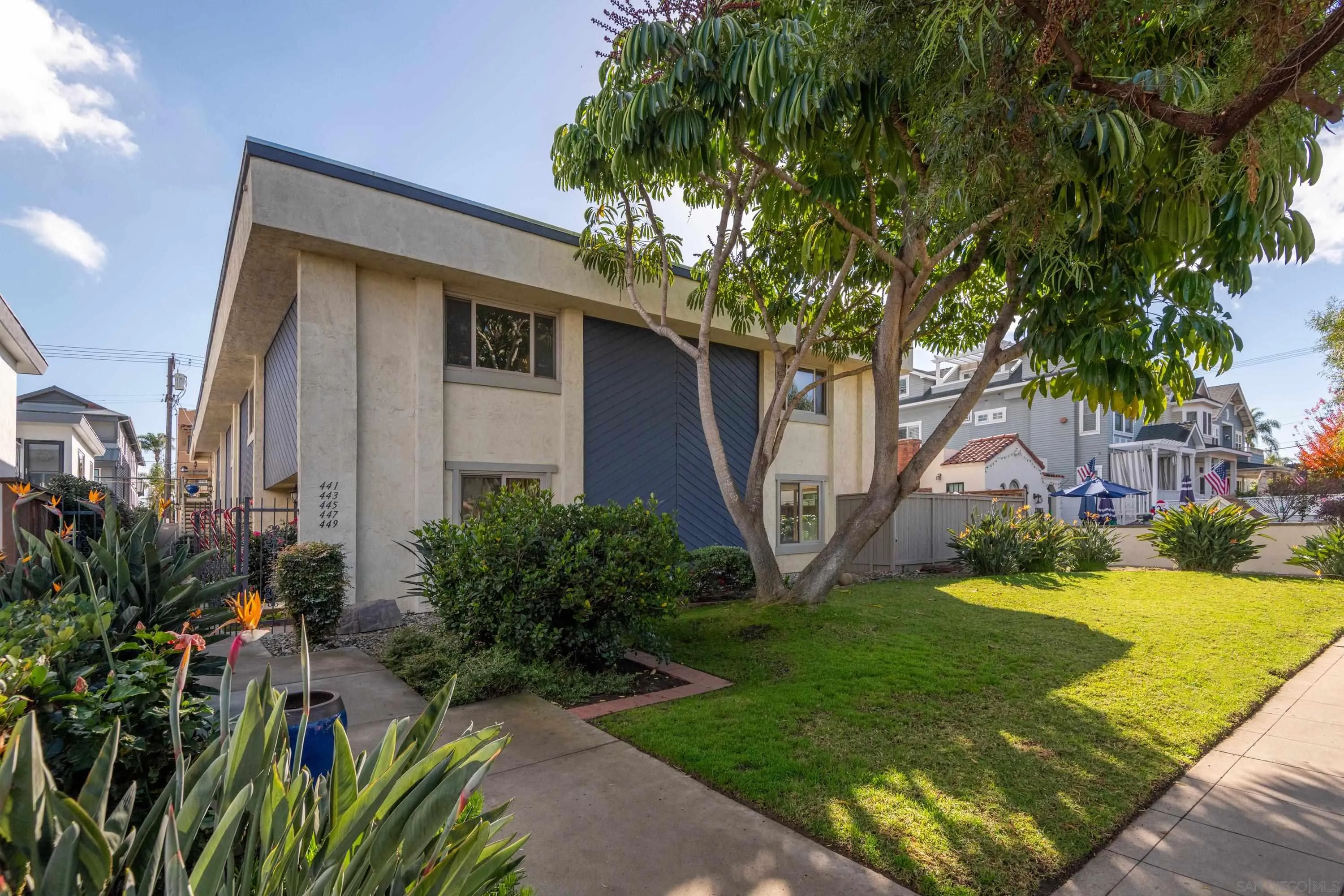 441 D Avenue Coronado, CA 92118 - Photo 20 of 24 a front view of a house with garden
