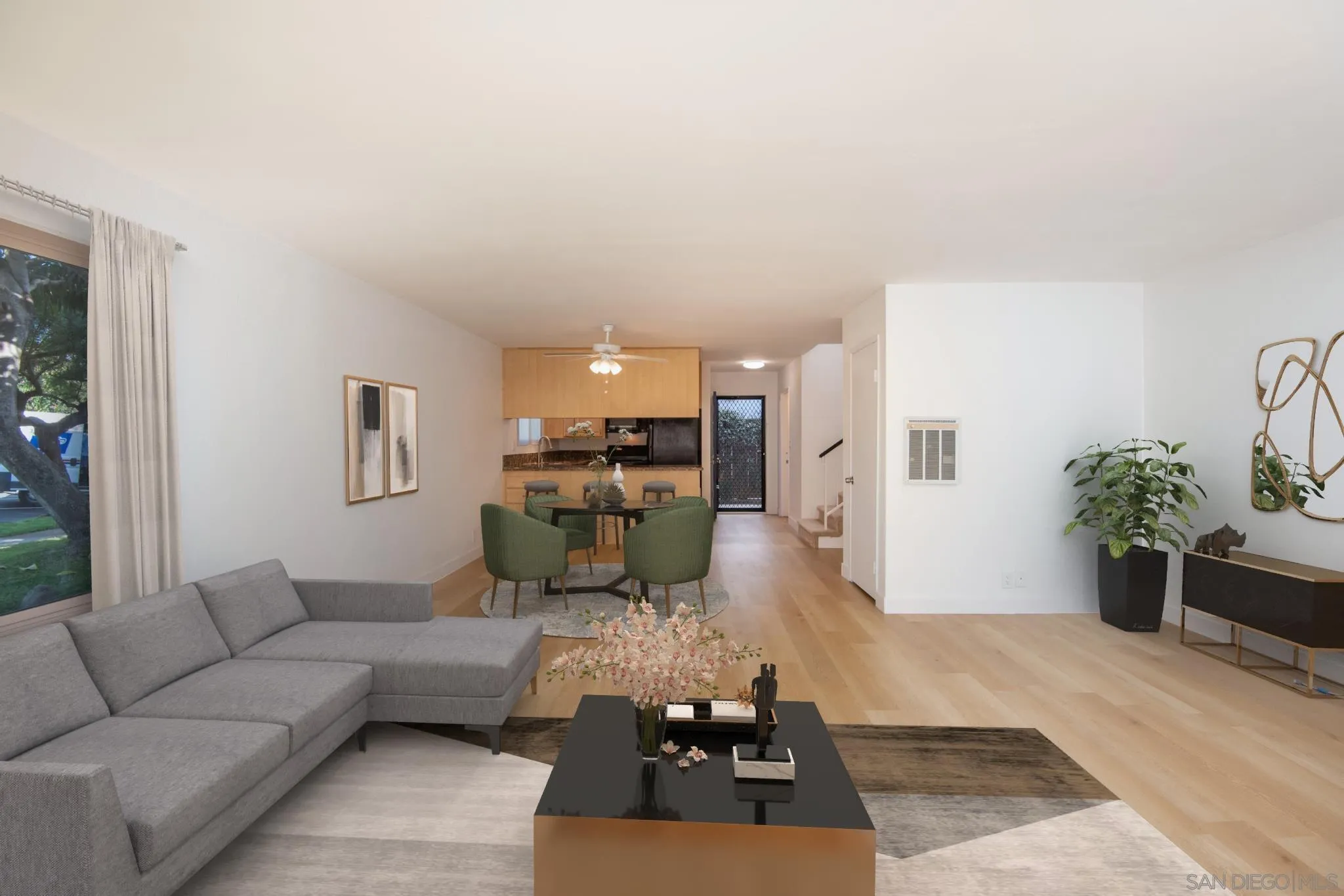 441 D Avenue Coronado, CA 92118 - Photo 2 of 24 a living room with furniture kitchen view and a window