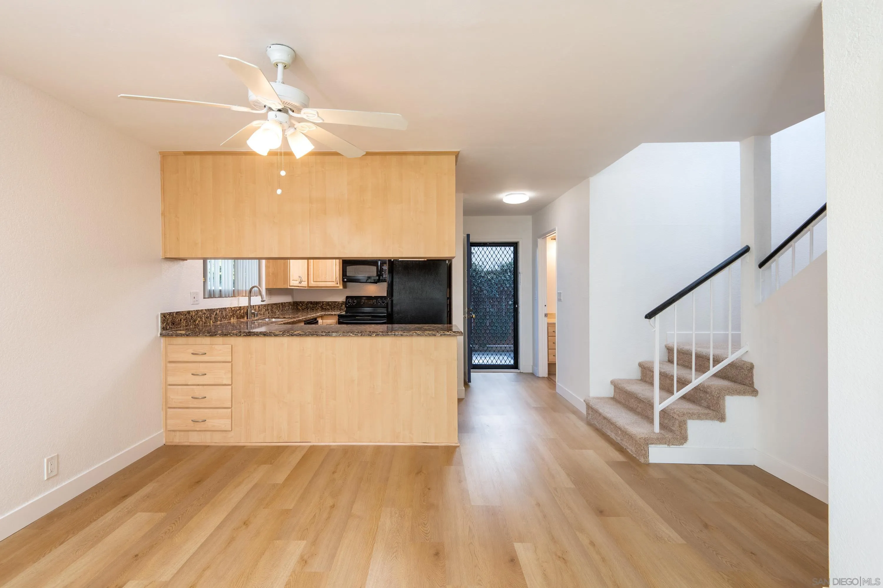 441 D Avenue Coronado, CA 92118 - Photo 5 of 24 a view of kitchen with cabinets and wooden floor