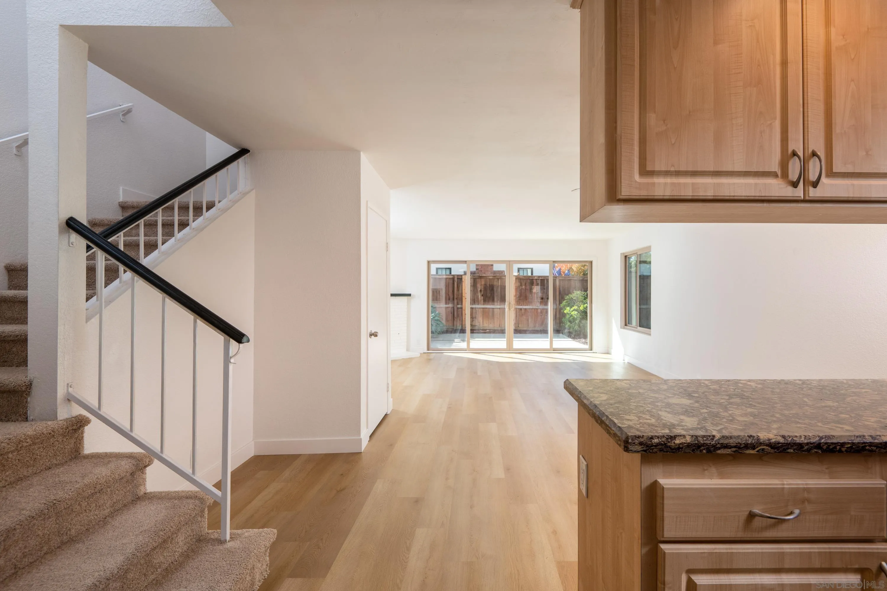 441 D Avenue Coronado, CA 92118 - Photo 6 of 24 a view of a kitchen cabinets and wooden floor