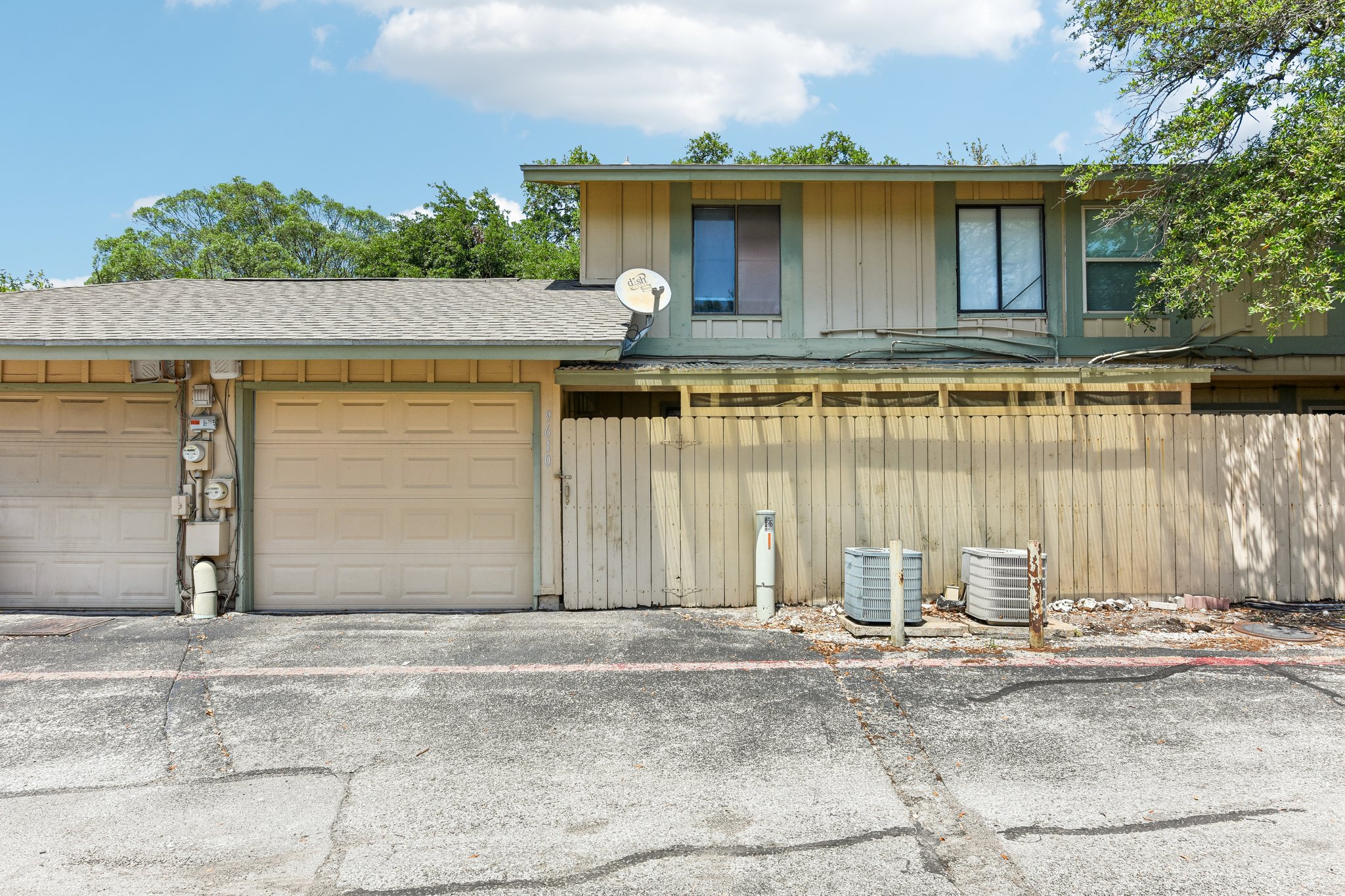 9610 Covey Ridge Lane Austin, TX 78758 - Photo 20 of 22 Two attached garages with panel doors