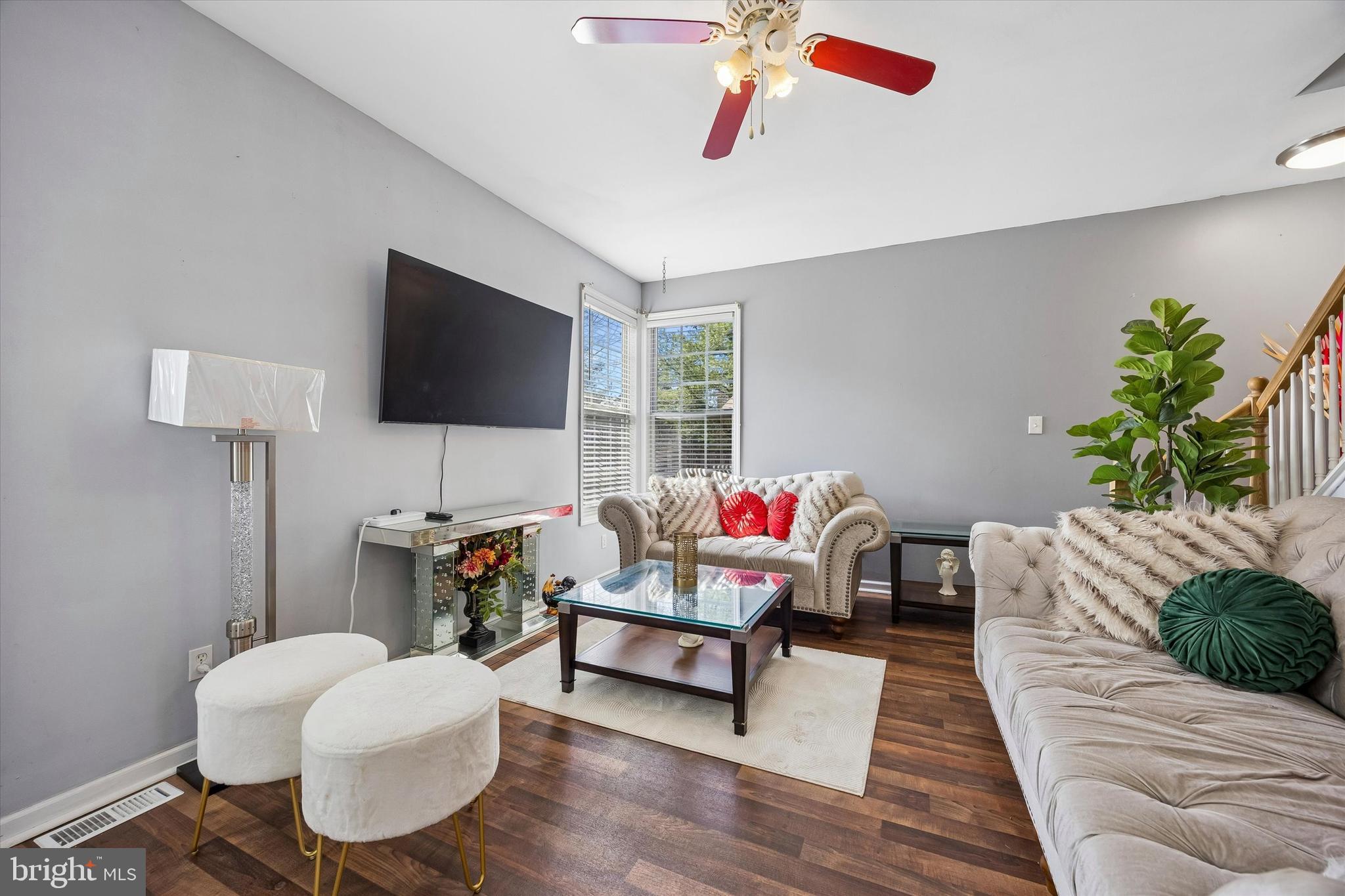 12 George Street Mount Ephraim, NJ 08059 - Photo 14 of 33 a living room with furniture and a flat screen tv