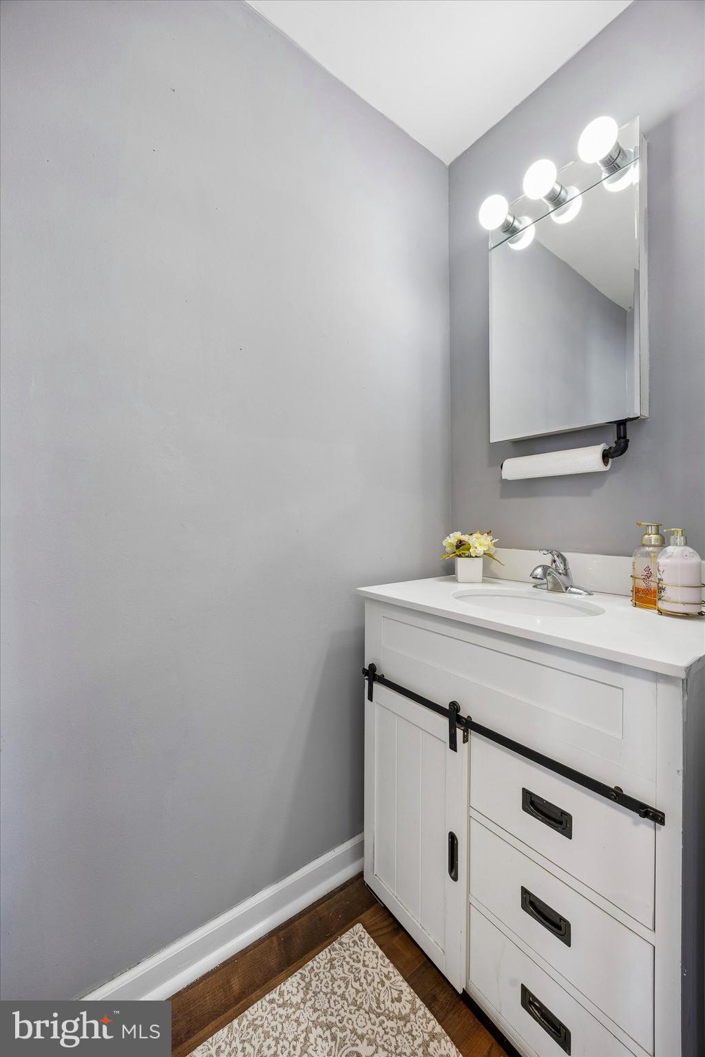 12 George Street Mount Ephraim, NJ 08059 - Photo 15 of 33 a bathroom with a sink and a mirror