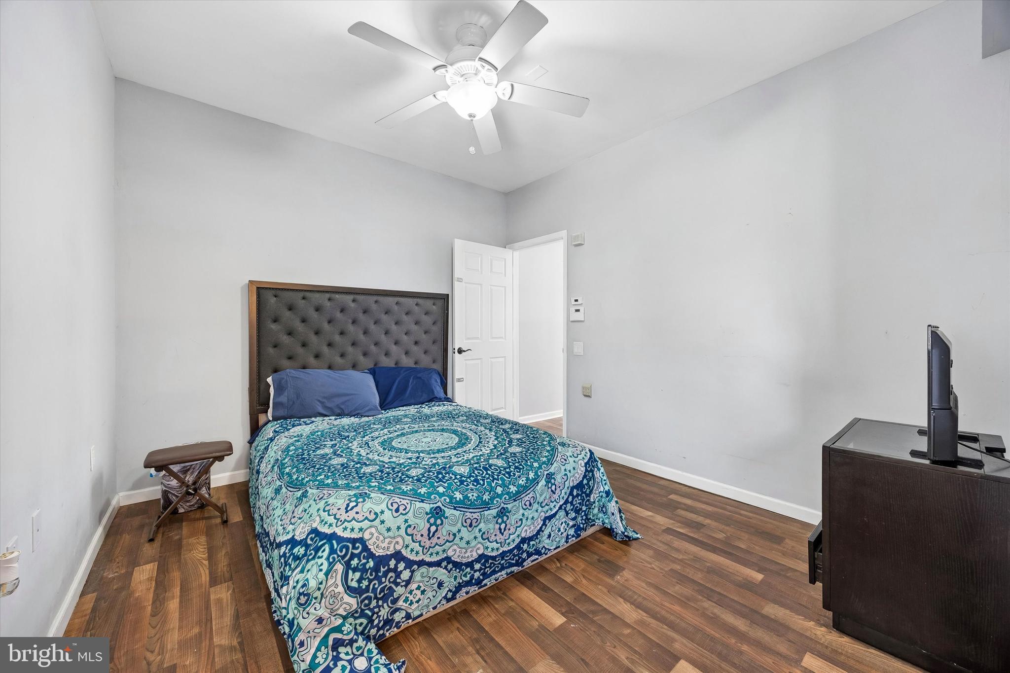 12 George Street Mount Ephraim, NJ 08059 - Photo 17 of 33 a bedroom with a bed and a fireplace