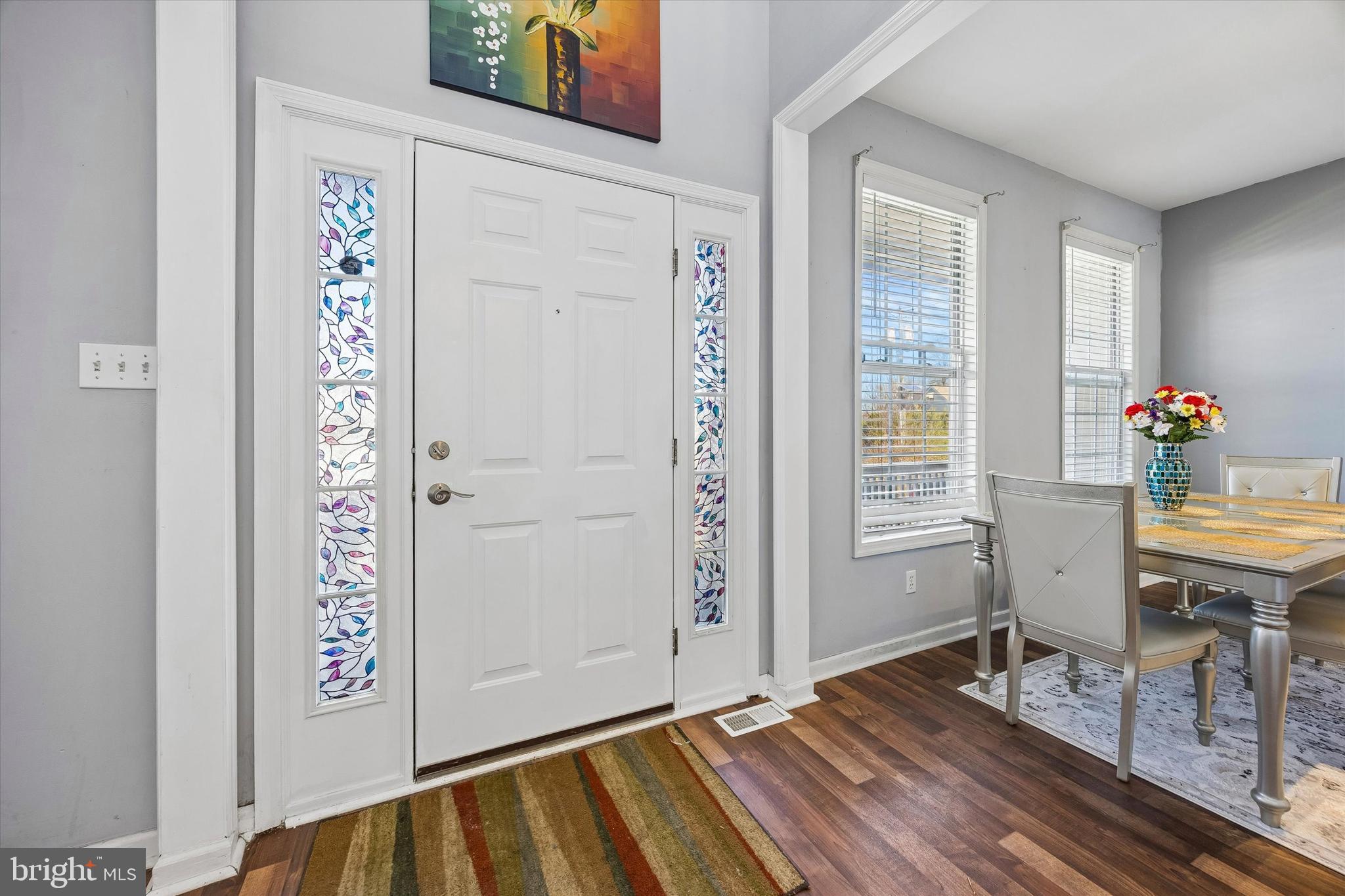 12 George Street Mount Ephraim, NJ 08059 - Photo 4 of 33 a view of a bedroom with window and wooden floor