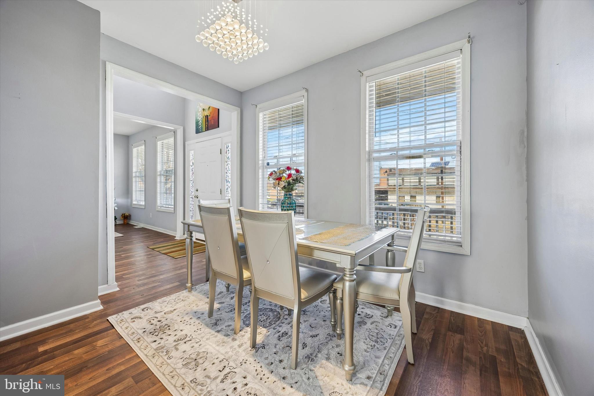 12 George Street Mount Ephraim, NJ 08059 - Photo 7 of 33 a view of a dining room with furniture window and wooden floor