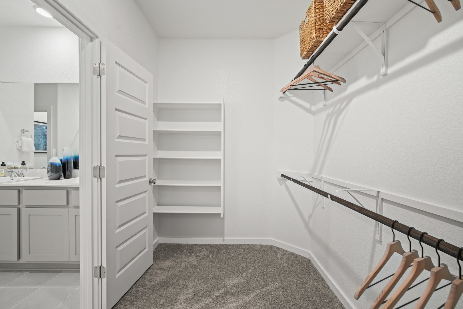 439 Lucky Avenue Elgin, TX 78621 - Photo 21 of 38 a view of walk in closet with empty racks