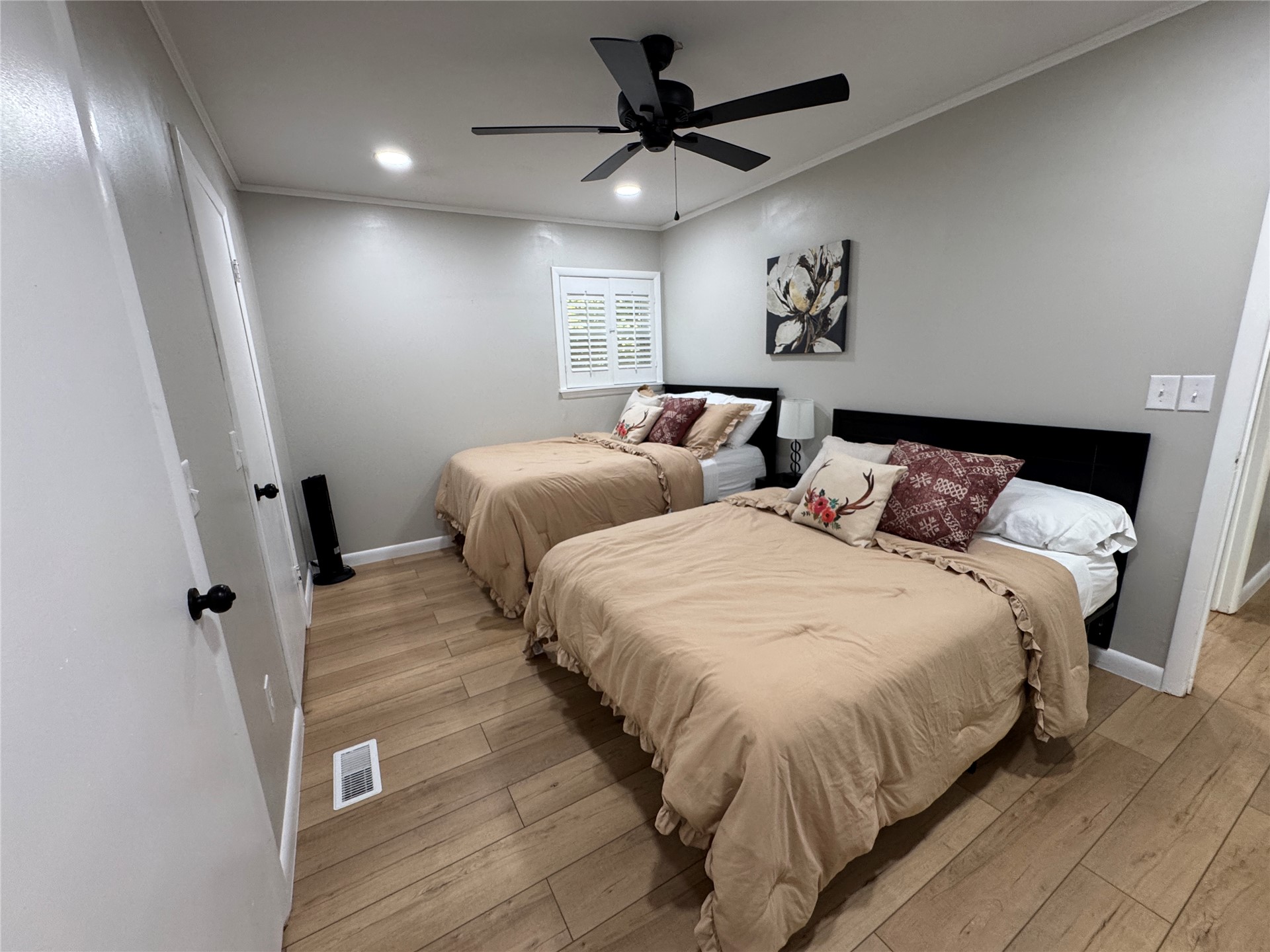 96358 South 4531 Road Vian, OK 74962 - Photo 26 of 58 Recessed lighting, ceiling fan, wood-finish flooring, and window with white shutters