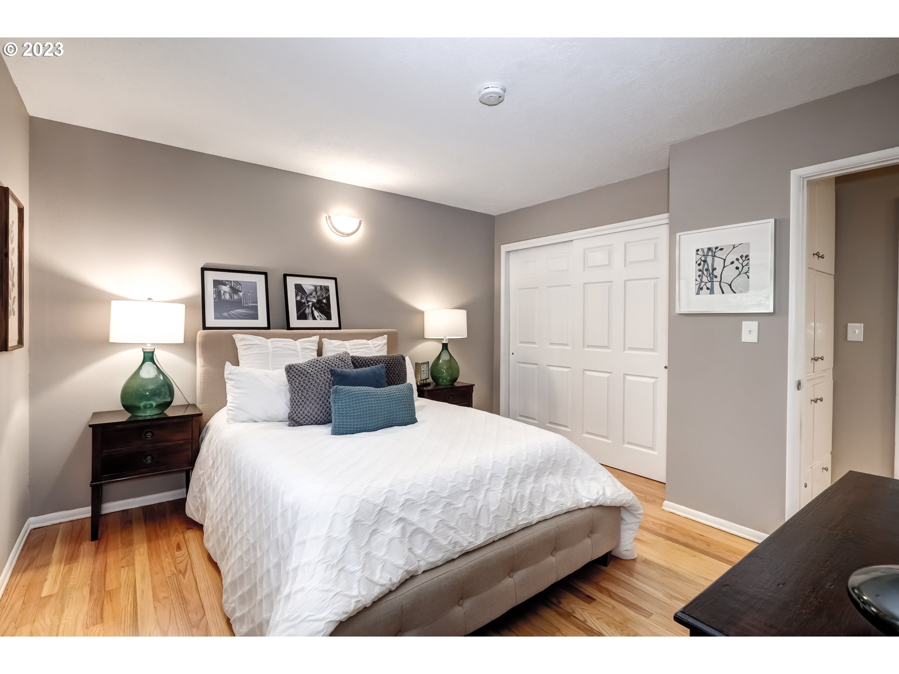 2540 Southeast 190th Avenue Gresham, OR 97030 - Photo 14 of 27 a bedroom with a bed and a painting on the wall