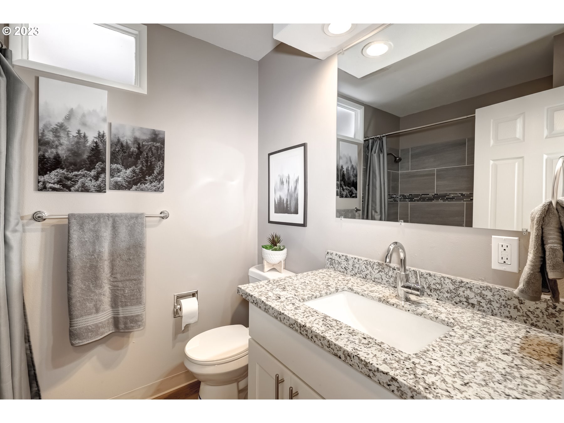 2540 Southeast 190th Avenue Gresham, OR 97030 - Photo 18 of 27 a bathroom with a granite countertop sink toilet and mirror