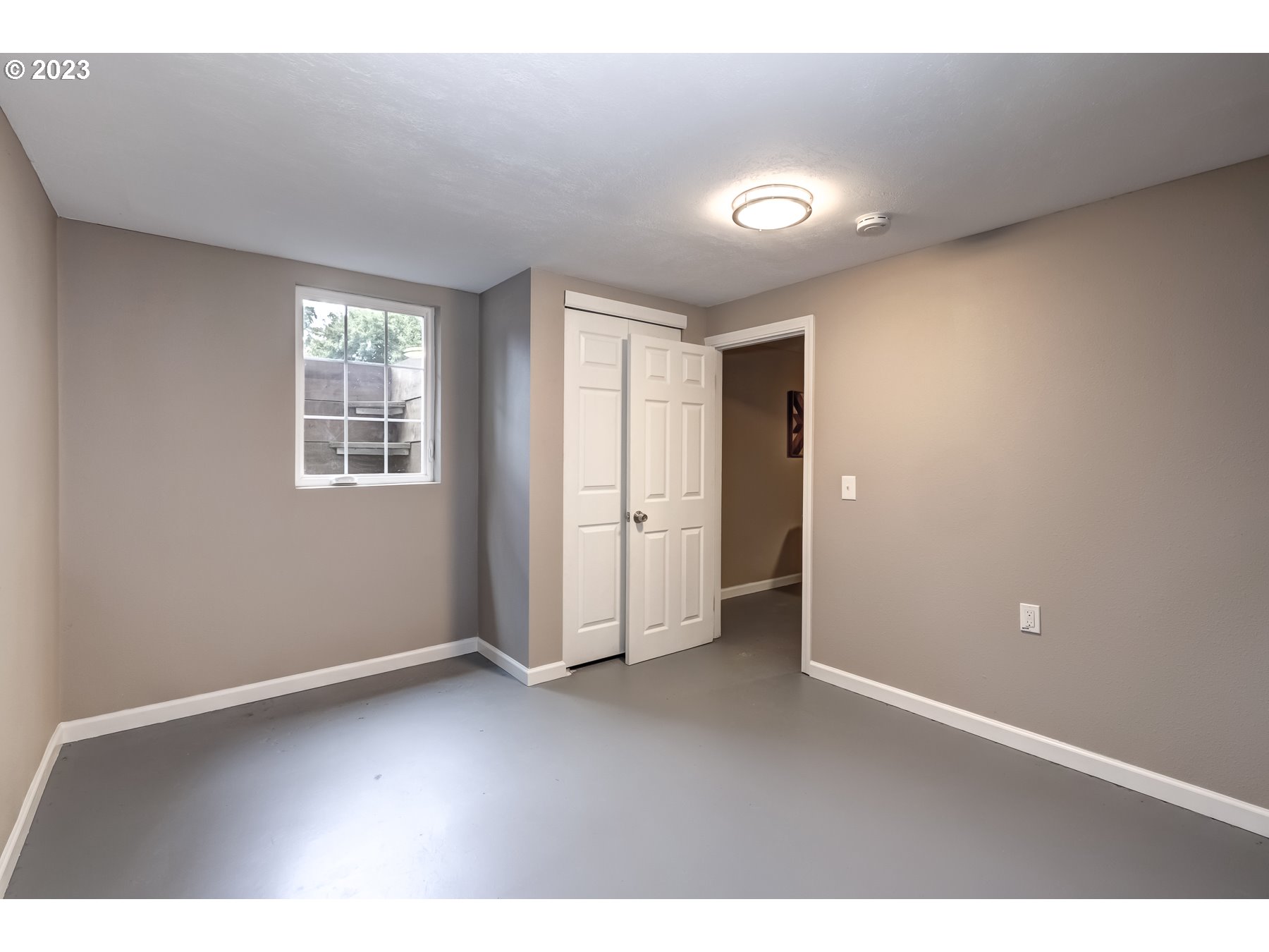 2540 Southeast 190th Avenue Gresham, OR 97030 - Photo 21 of 27 an empty room with windows and closet