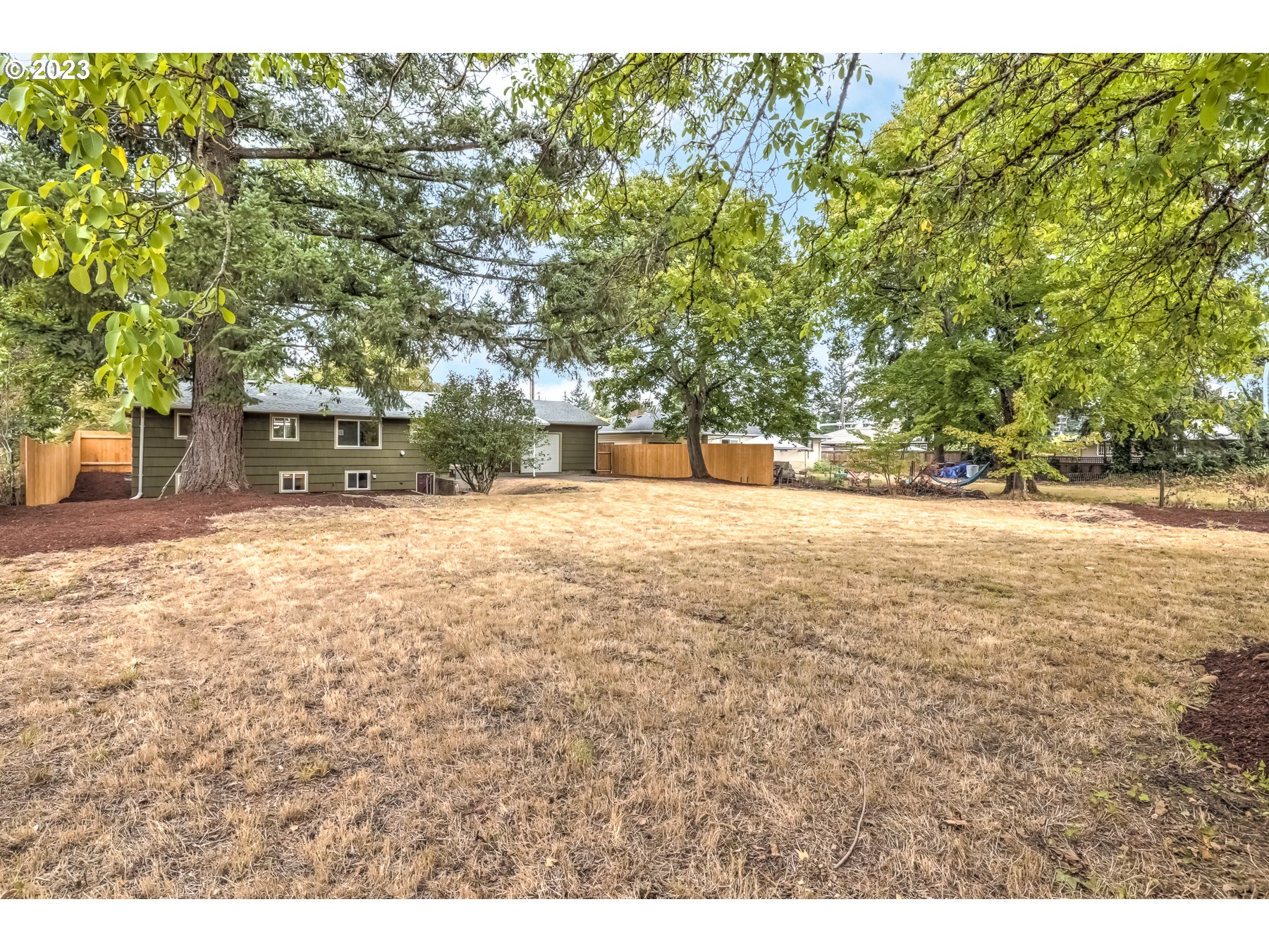 2540 Southeast 190th Avenue Gresham, OR 97030 - Photo 27 of 27 a view of a yard with a tree
