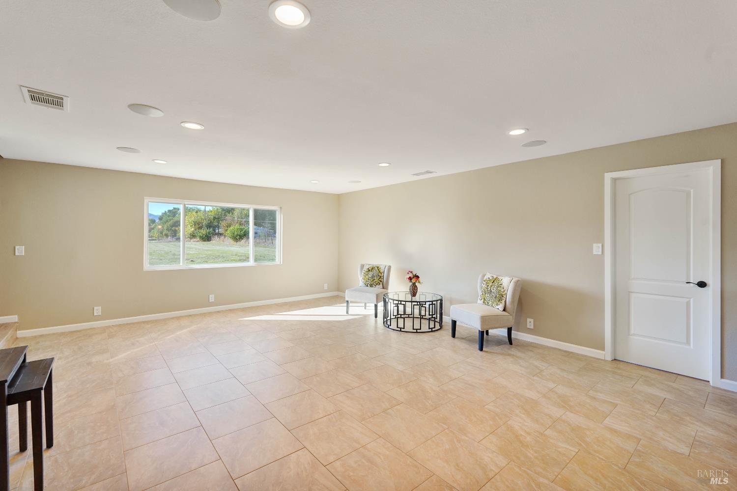 7208 Browns Valley Road Vacaville, CA 95688 - Photo 19 of 64 a view of an empty room with a window