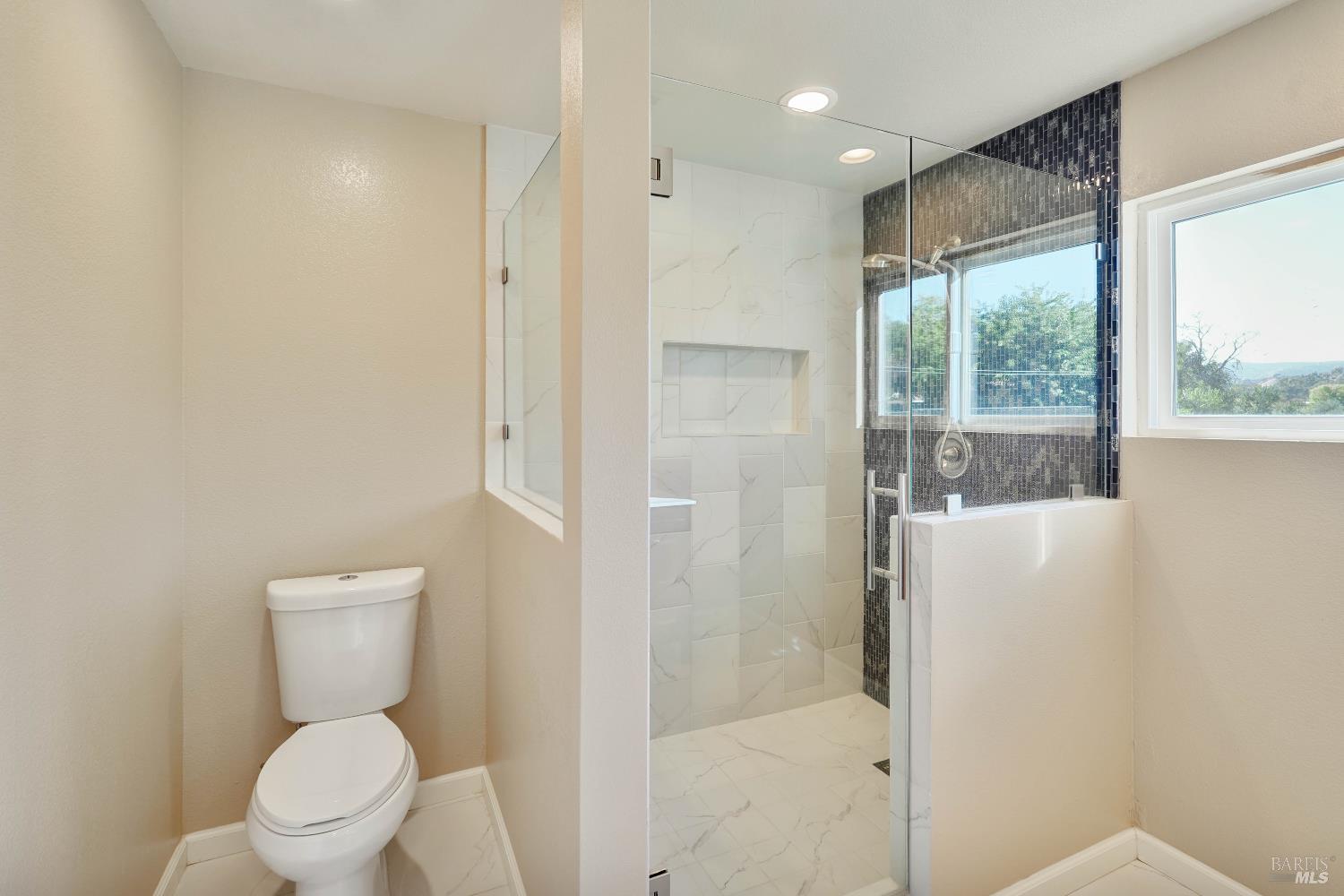 7208 Browns Valley Road Vacaville, CA 95688 - Photo 24 of 64 a bathroom with a toilet a sink and a shower