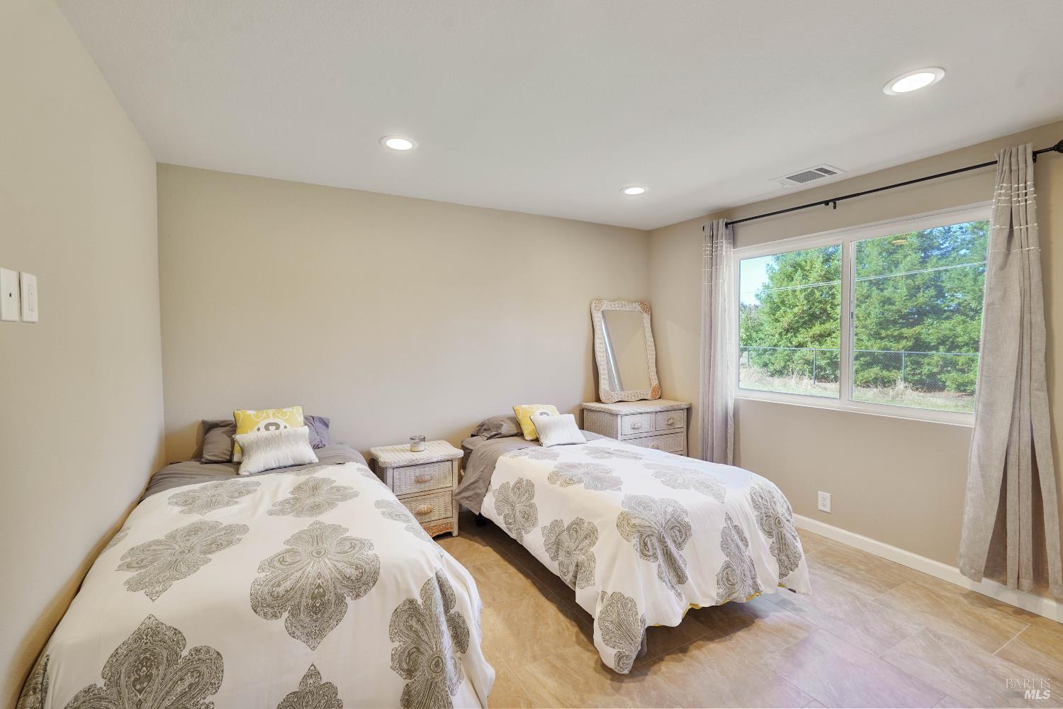 7208 Browns Valley Road Vacaville, CA 95688 - Photo 28 of 64 a bedroom with two beds and a window