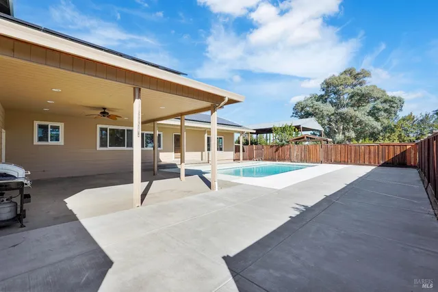 a view of a house with entertaining space