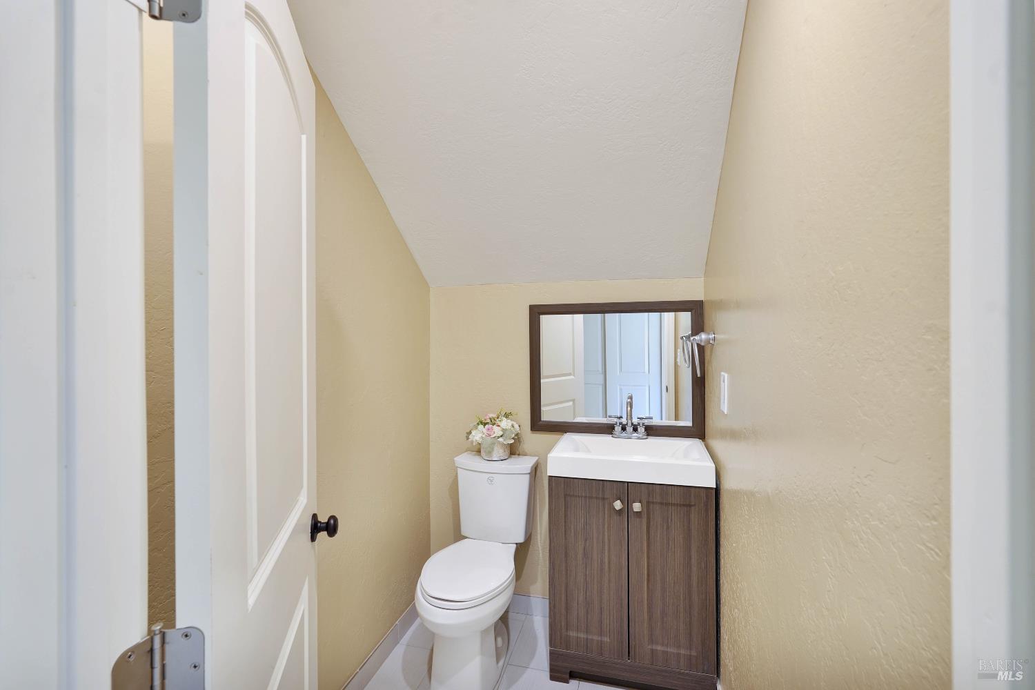 7208 Browns Valley Road Vacaville, CA 95688 - Photo 32 of 64 a bathroom with a sink toilet and vanity