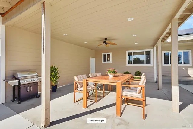 a view of a forest with a yard