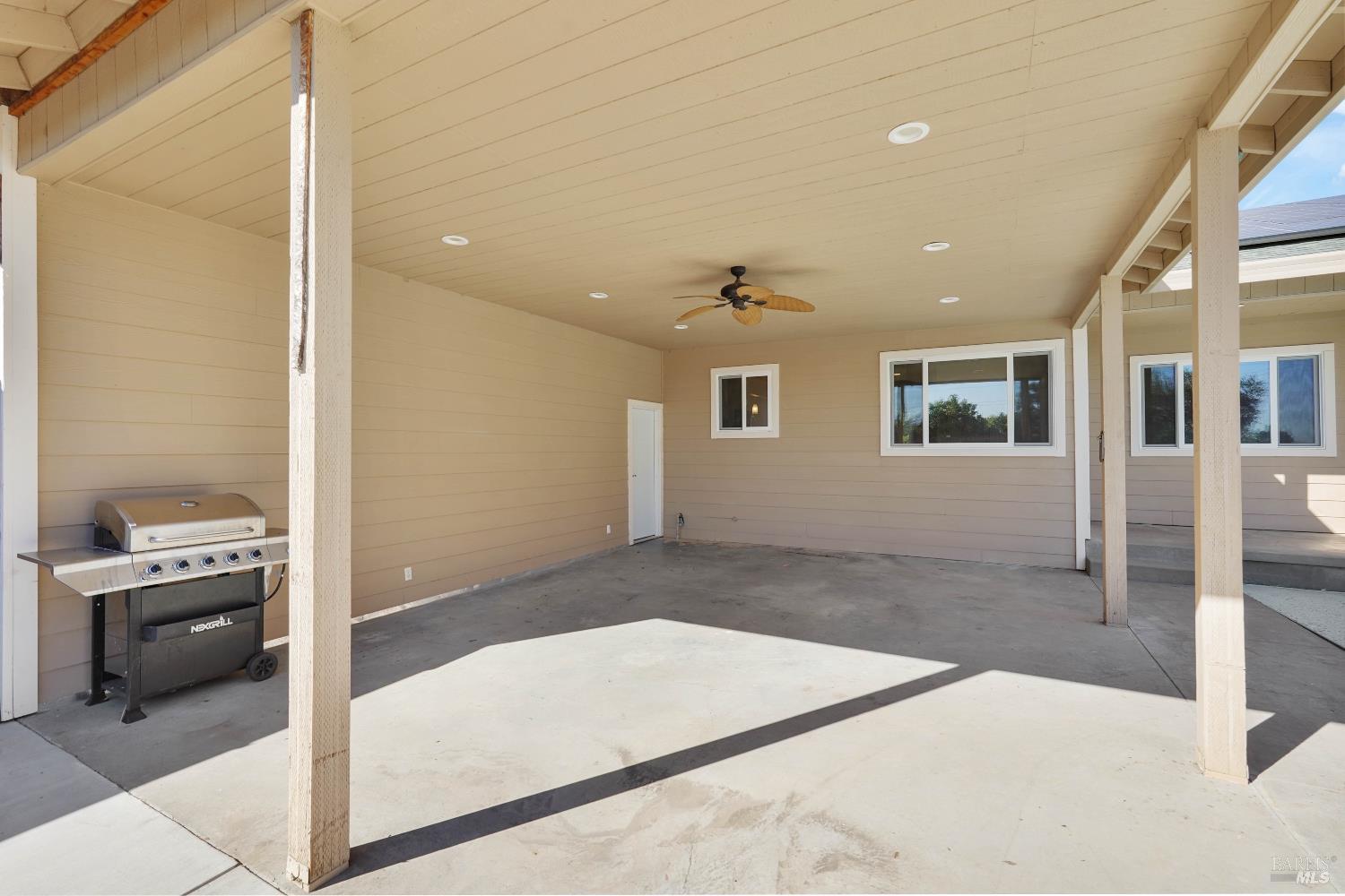 7208 Browns Valley Road Vacaville, CA 95688 - Photo 43 of 64 a view of a hallway with a livingroom with furniture