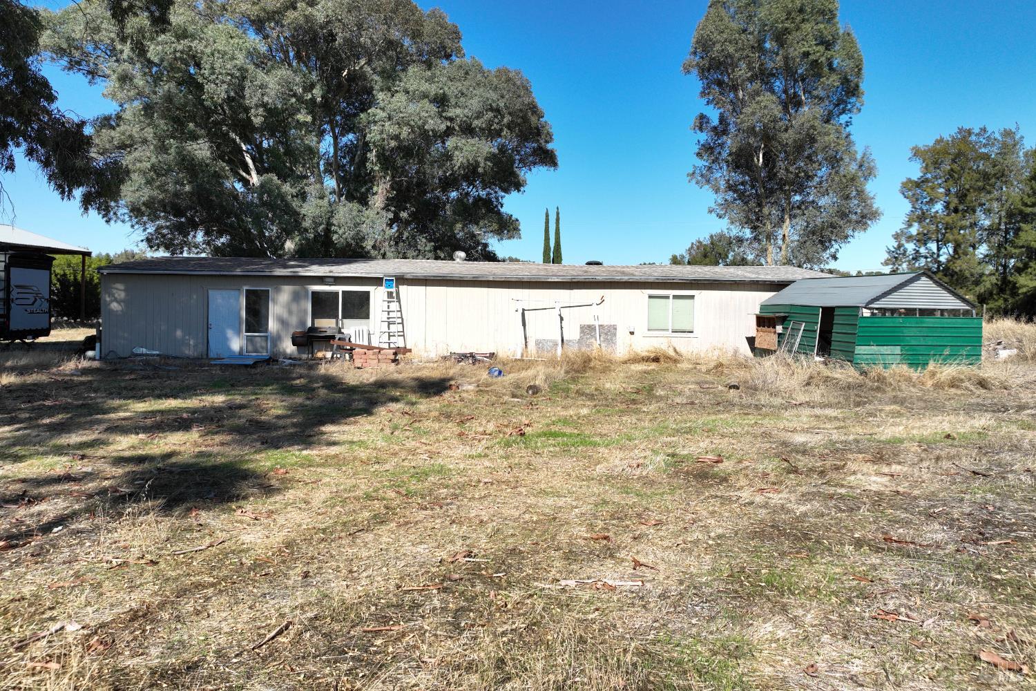 7208 Browns Valley Road Vacaville, CA 95688 - Photo 48 of 64 a view of house with backyard and seating area