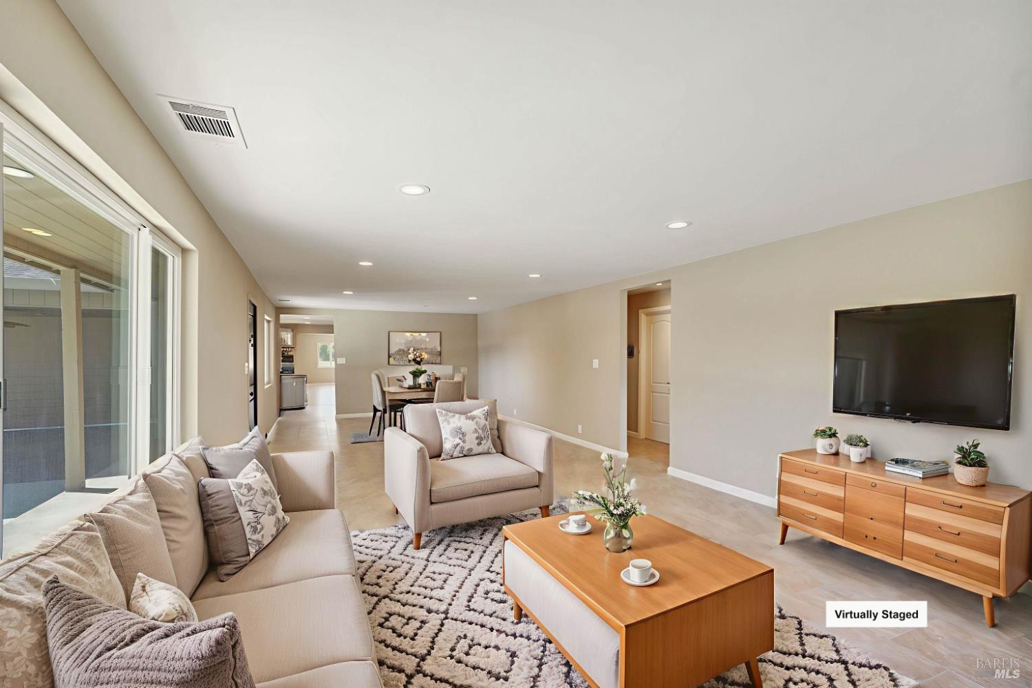 7208 Browns Valley Road Vacaville, CA 95688 - Photo 7 of 64 a living room with furniture and a flat screen tv