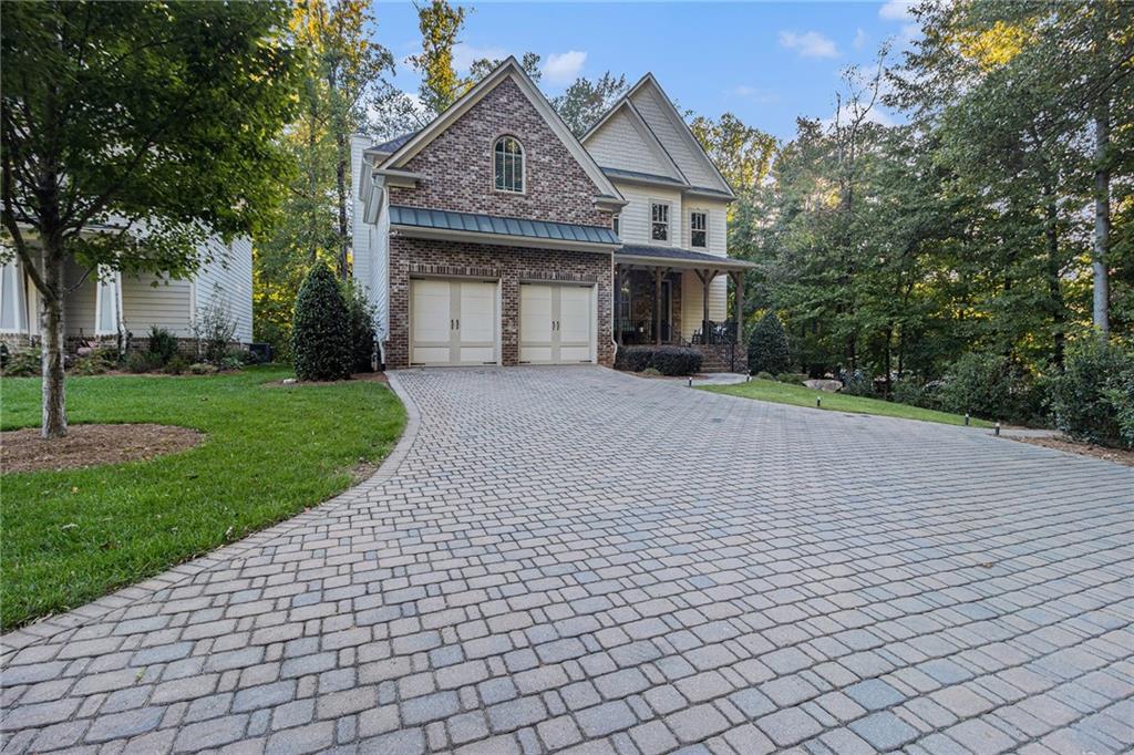 519 Holcomb Bridge Road Norcross, GA 30071 - Photo 2 of 31 a front view of a house with a yard