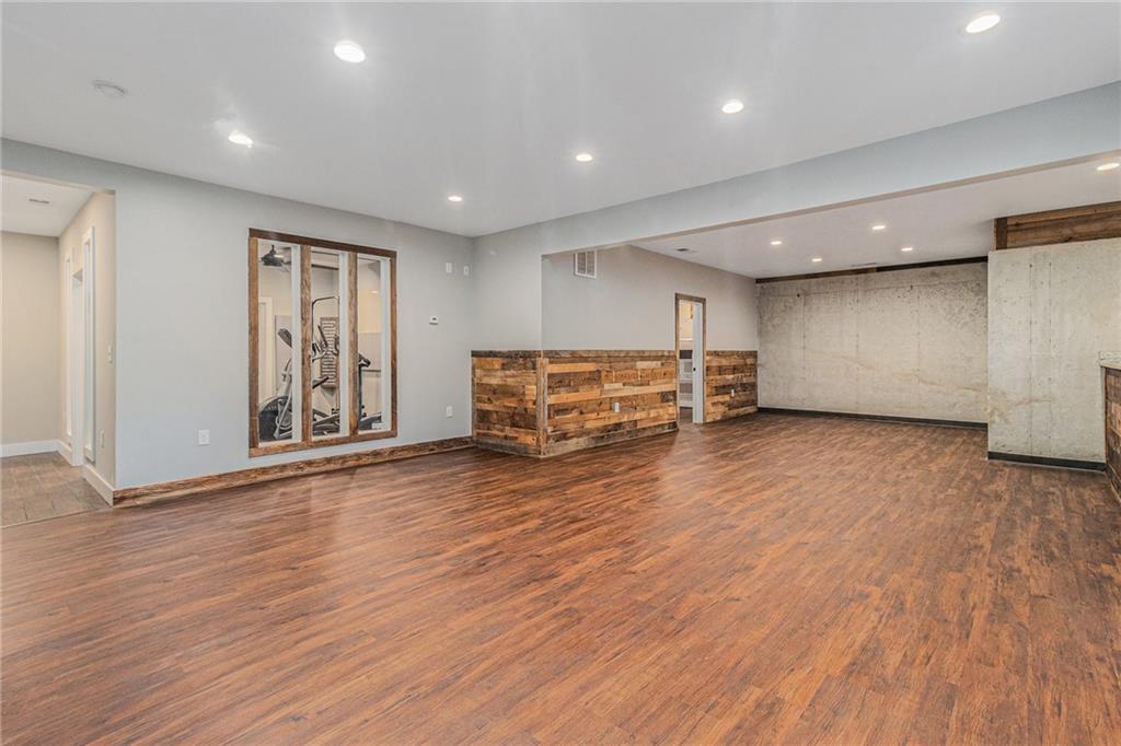 519 Holcomb Bridge Road Norcross, GA 30071 - Photo 24 of 31 a view of empty room with wooden floor