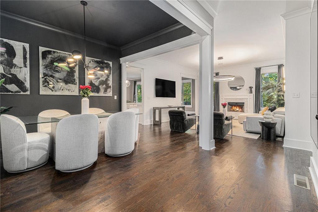 519 Holcomb Bridge Road Norcross, GA 30071 - Photo 7 of 31 a living room with furniture large window and a flat screen tv