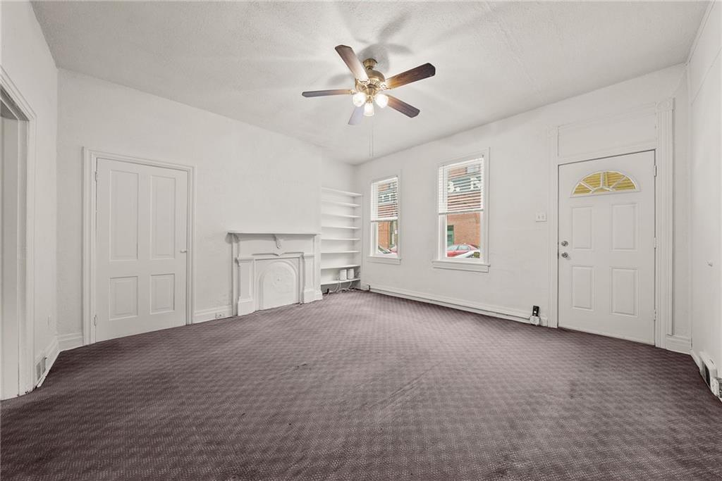 2016 Sidney Street Pittsburgh, PA 15203 - Photo 3 of 44 a view of an empty room with a window