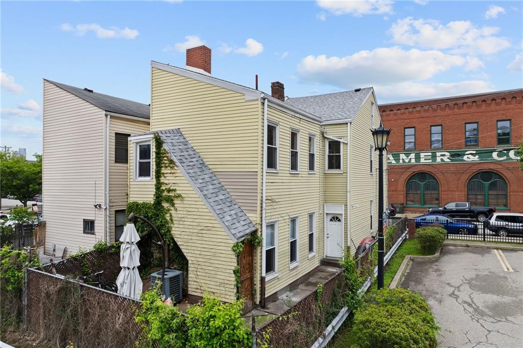 2016 Sidney Street Pittsburgh, PA 15203 - Photo 32 of 44 a view of a house with backyard and sitting area