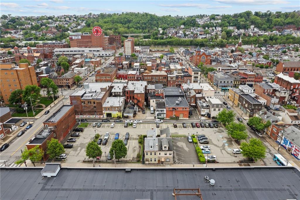 2016 Sidney Street Pittsburgh, PA 15203 - Photo 38 of 44 an aerial view of a city with lots of residential buildings ocean and mountain view in back