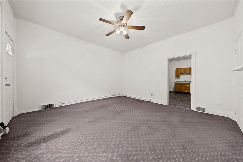 2016 Sidney Street Pittsburgh, PA 15203 - Photo 7 of 44 an empty room with closet and fan