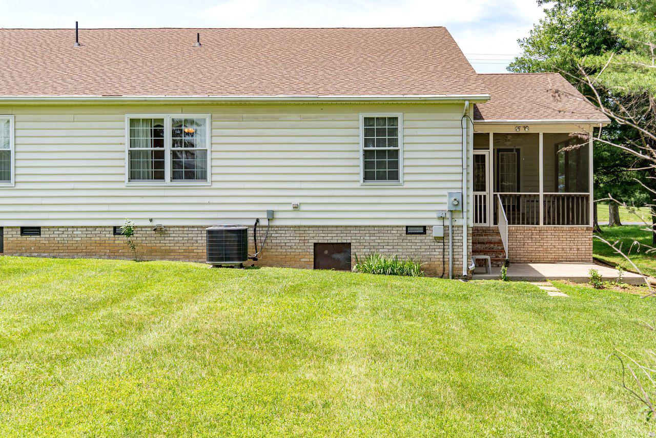 849 South Ox Road Woodstock, VA 22664 - Photo 49 of 51 Charming home with lush green lawn.