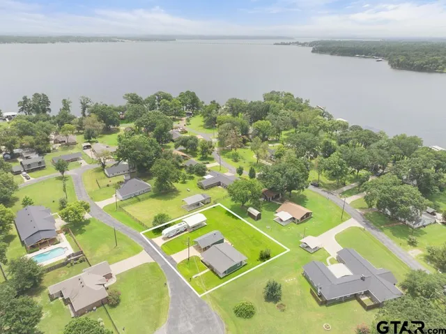 an aerial view of a swimming pool