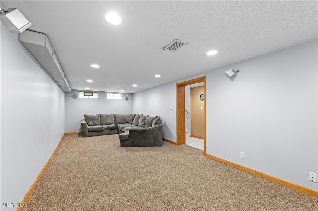 625 Pendley Road Willowick, OH 44095 - Photo 23 of 28 Basement finished area with carpet floors and recessed lighting